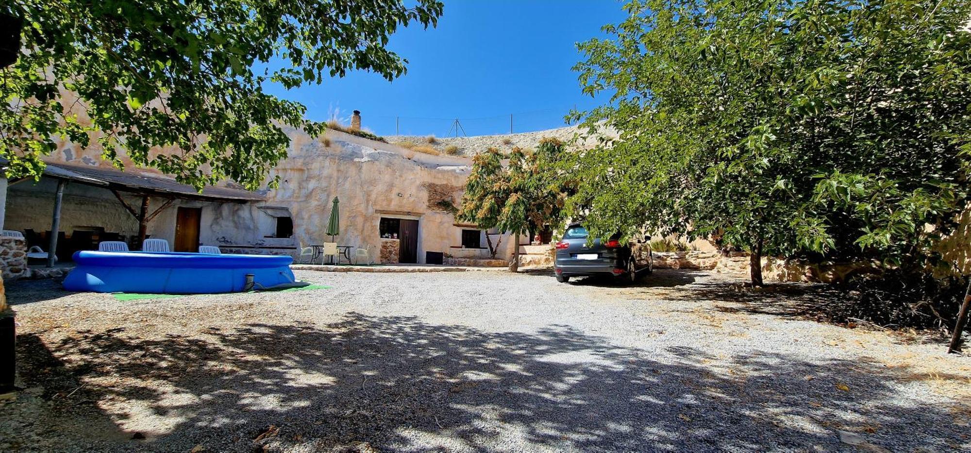 Casa Cueva Cascamorras "Capricho Andaluz" Baza Bagian luar foto