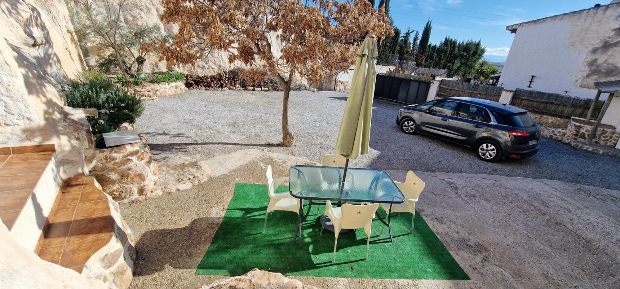 Casa Cueva Cascamorras "Capricho Andaluz" Baza Bagian luar foto